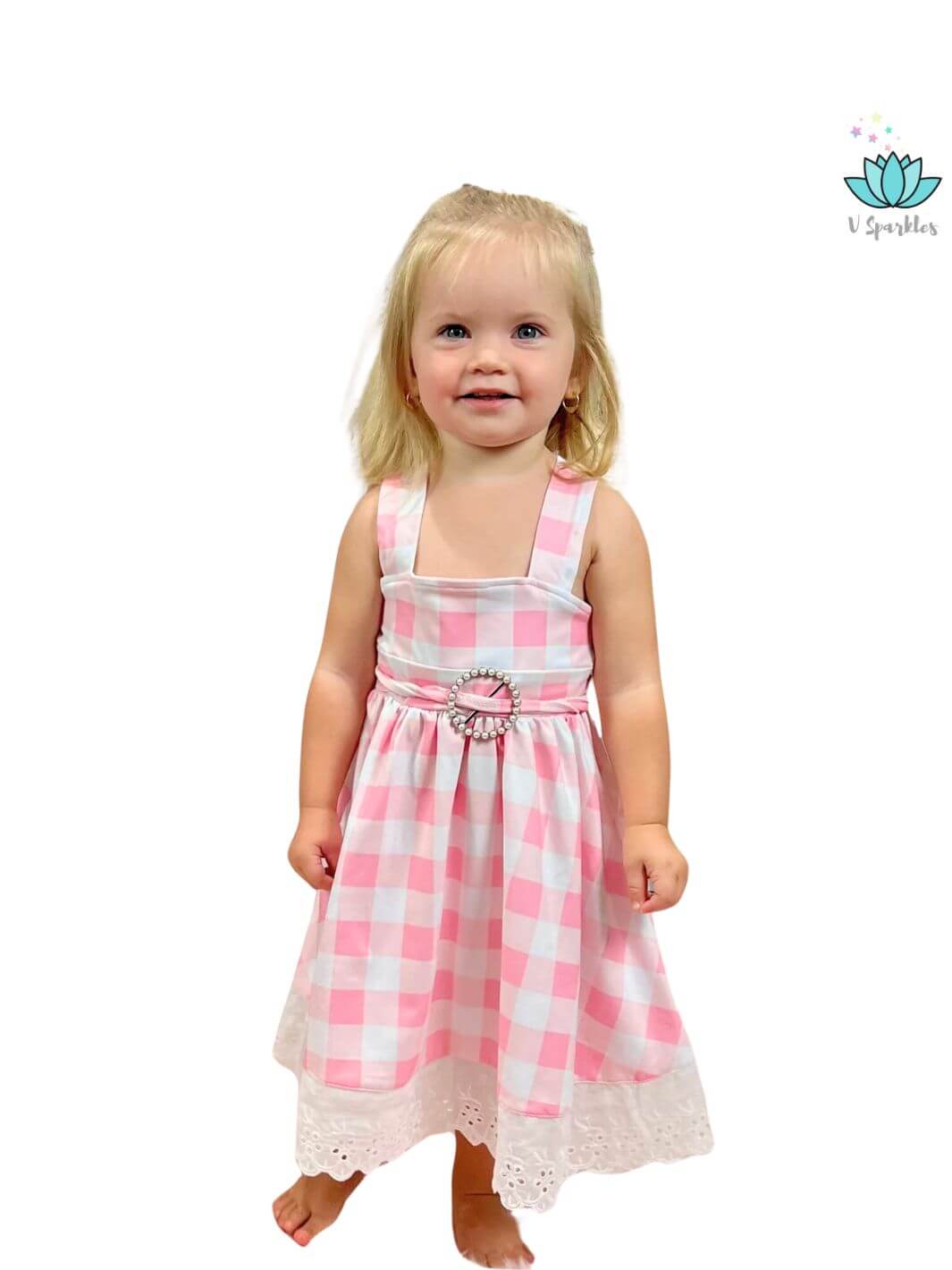 "Barbie pink gingham dress for kids, stylish for Disneybounding, birthday dress to impress, or a fun Halloween costume. Ideal for playing pretend and sparking creativity.