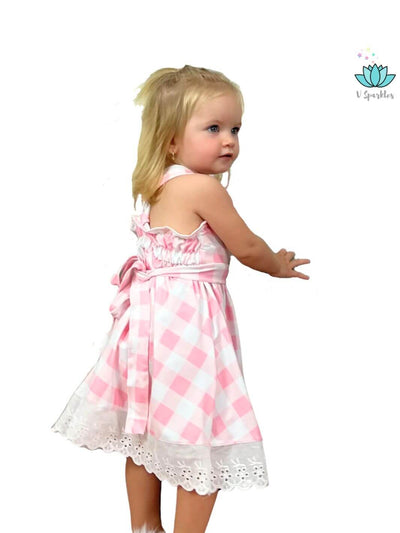 "Disneybound Barbie pink gingham dress for kids, a charming option for Halloween costumes, birthday outfits, and dress-up games. Perfect for fashion-forward little ones.