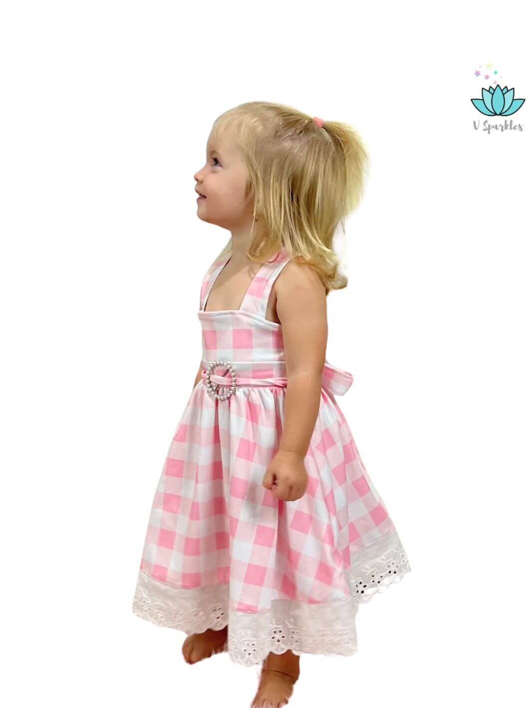 "Fashionable Barbie costume for kids in pink gingham, perfect for Disneybounding, Halloween costumes, birthday dress, or dress-up fun. A gift for stylish little fashionistas.