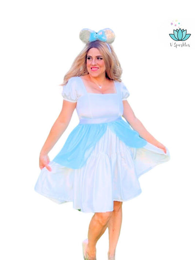 Ice Queen Blue Dress-Up Overskirt for Women – Perfect for Halloween and Disneybounding – Channel your inner Queen Elsa with this enchanting blue dress-up overskirt, perfect for Halloween parties, Disneybounding adventures, or special events. Available in mid-size and plus-size options.