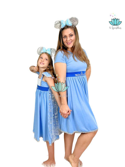 Elsa Frozen Disneybound Matching Dress for Adults and Kids: A delightful mother-daughter Elsa-inspired outfit, featuring icy blue tones and snowflake details. Perfect for Disneybounding adventures, Halloween, or birthdays, this set makes a wonderful gift for kids who love play pretend and adults looking for a fun, fashionable self treat.