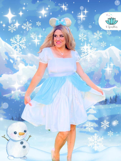 Ice Queen Blue Dress-Up Overskirt for Adults – Queen Elsa-Inspired Costume Accessory – This stunning blue overskirt is perfect for transforming into Queen Elsa. Ideal for Disneybounding, Halloween costumes, or themed holiday events. Available in mid-size and plus-size options.