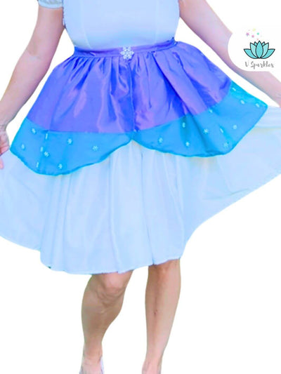 Ice Queen Purple Dress-Up Overskirt for Women – Complete Queen Elsa Transformation – Pair this beautiful purple dress-up overskirt with any base dress for a full Queen Elsa-inspired transformation. Perfect for Disneybounding, Halloween parties, or holiday celebrations. Available in mid-size and plus-size options.