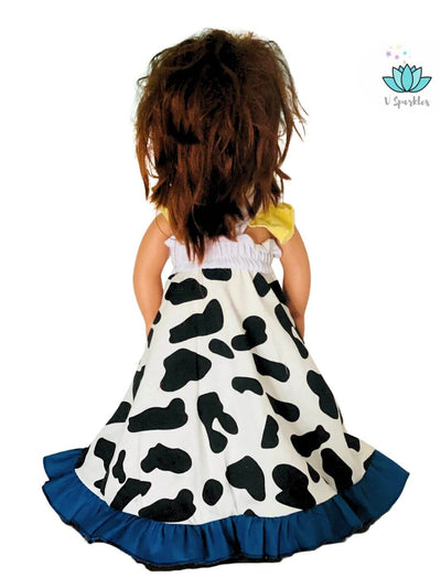 "Jessie-inspired cowboy doll dress with yellow bodice and cow-print skirt, designed for Disneybound adventures or a magical Halloween costume. Great for fashion and gift lovers.