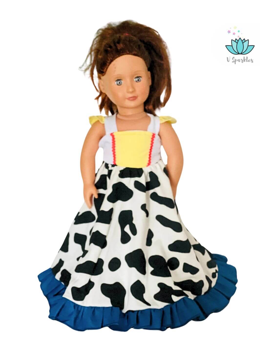 "Cowgirl Jessie-inspired doll dress with iconic cow-print design, great for kids’ play pretend and dress up games or a perfect Disneybounding look.