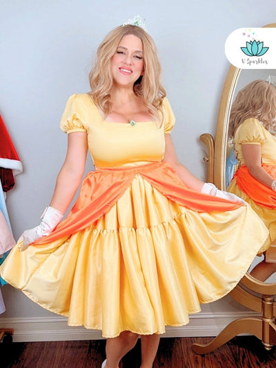 Yellow Princess Video Game Dress Set for Adults – Easy Princess Peach Costume Transformation – This Princess Peach-inspired yellow dress set offers an effortless transformation into the iconic video game princess, perfect for Disneybounding or Halloween parties. Available in mid-size and plus-size options.