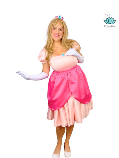 Pink Princess Dress Set for Adults – Complete Princess Peach Transformation – This stunning pink dress set offers a full Princess Peach-inspired transformation, perfect for Disneybounding, Halloween parties, or holiday celebrations. Available in mid-size and plus-size options.